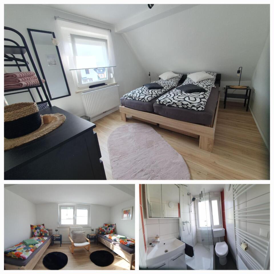 Diese Ferienwohnung am See besteht aus drei Räumen: einem Schlafzimmer mit einem Doppelbett, einem Zimmer mit zwei Einzelbetten und einem Badezimmer mit Dusche, Toilette und Waschbecken. Alle Räume sind hell, haben weiße Wände und sind modern eingerichtet.